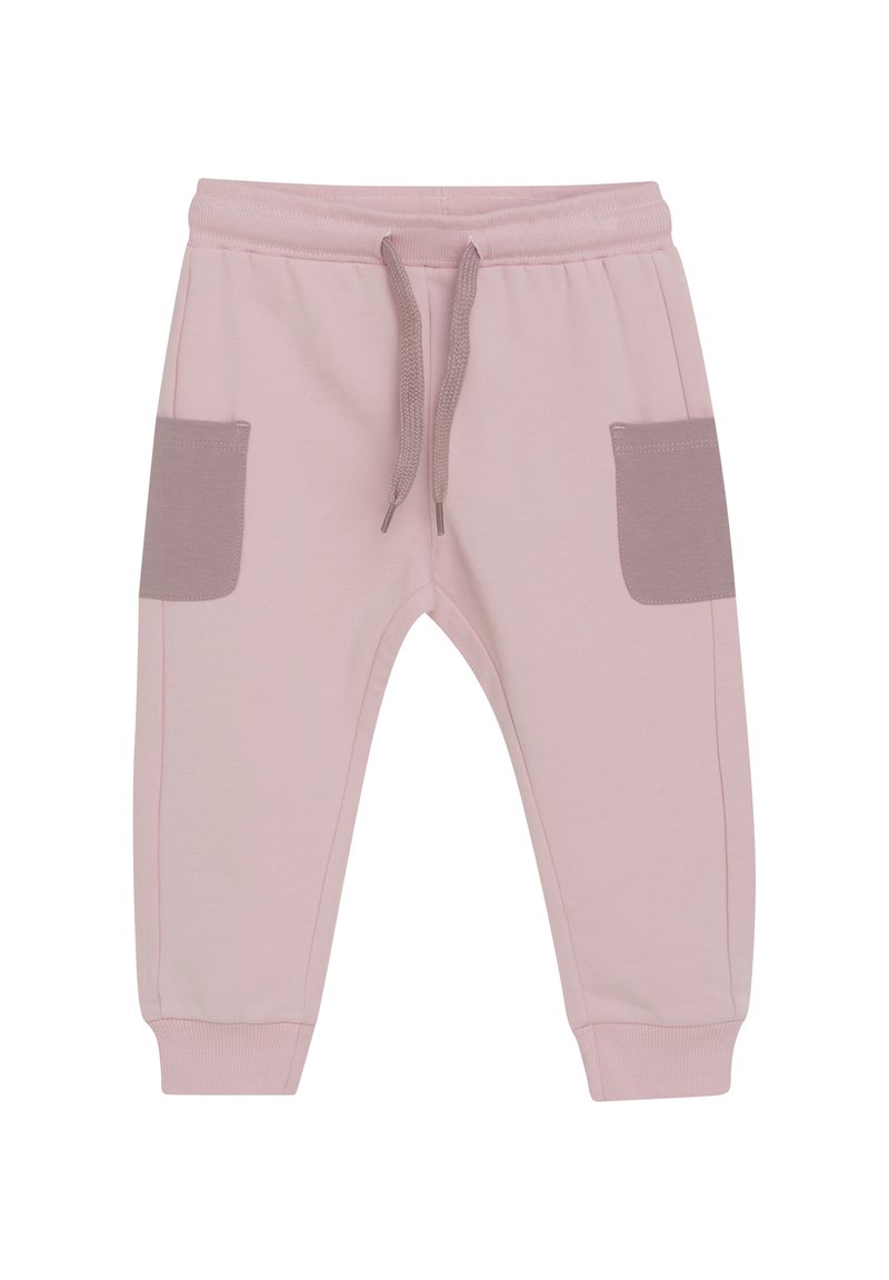 Rosa bomullsjoggare med dragsko i midjan, ribbade ärmslut och två kontrasterande ljusbruna sidofickor. Slät textur, avslappnad design.