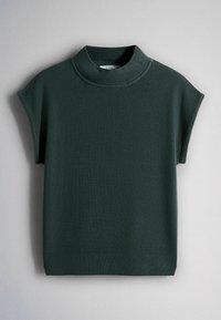 Dark green knit sleeveless sweater with high round neck and ribbed edges on sleeves and hem, displayed on a light gray background.