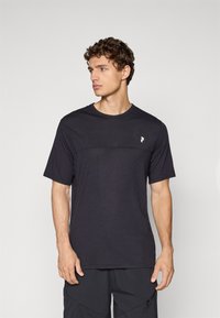 Black short-sleeve t-shirt made of soft fabric, featuring a contrasting white logo on the left chest and a simple round neckline.