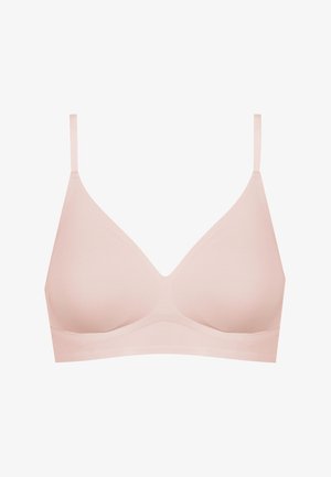 Soutien-gorge seamless rose clair avec des bretelles fines réglables, une texture douce et des bonnets en forme de triangle, sans armature ni rembourrage.