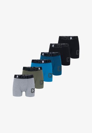Vijf paar herenboxershorts in grijs, olijfgroen, twee tinten blauw en zwart met zwarte taillebanden met een klein wit figuurtje en tekst.