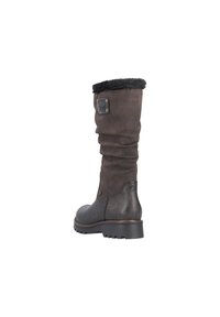 Botas marrones hasta la rodilla con un diseño holgado, que presentan un puño similar a piel de fur, detalles de cuero texturizado y una suela de goma resistente.