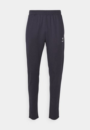 Donkerblauwe sportbroeken van zachte stof, met een elastische tailleband en een klein logo aan de zijkant. Tapered pasvorm.