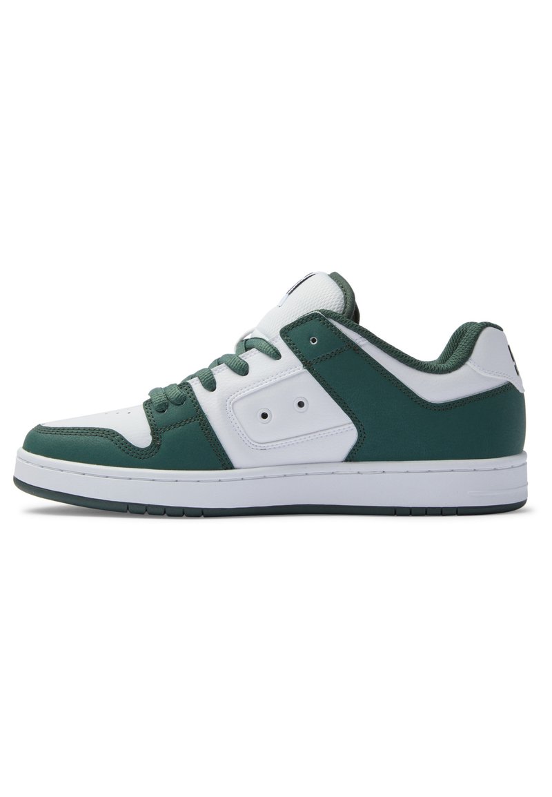Green and white athletic shoe with a low-top design, textured fabric, round toe, and contrasting accents on the sides and tongue.