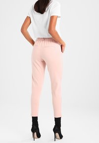 ONLY Tracksuit bottoms - light pink