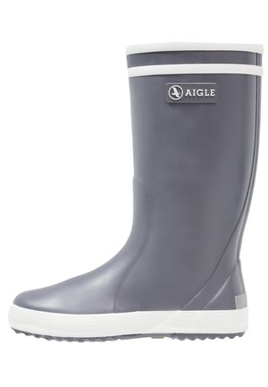 Botte de pluie en caoutchouc gris foncé pour enfants avec garniture blanche et logo Aigle sur la tige supérieure, vue de côté.