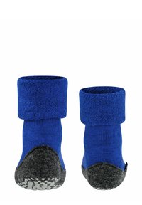 Calzini in tessuto lavorato a maglia blu con risvolto, tacco in feltro grigio e puntini in gomma testurizzata sulla suola per una maggiore aderenza.