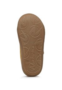 Suola di una scarpa con un fondo in gomma marrone testurizzato, caratterizzato da un motivo circolare a logo e con il marchio "Natutro" impresso sulla superficie.