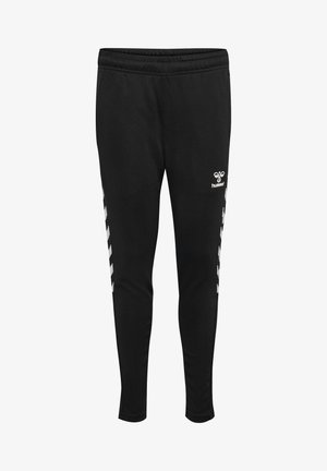 Czarne sportowe spodnie z białymi paskami w kształcie jaskółki po bokach, elastycznym pasem i białym logo hummel na górnej części uda.