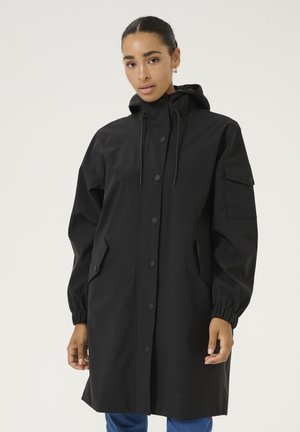 Mustamata veekindel parka kapuutsiga, nööbid, ees taskud ja elastsed varrukataskud. Kerge materjal sileda pinnaga.