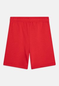 Røde bomullsshorts med elastisk midje. Glatt tekstur, knelengde og uten ytterligere mønstre eller maskinvare detaljer.