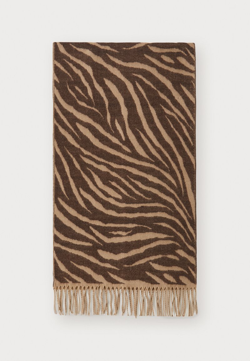 Brun zebra-mønstret tæppe med frynset kanter, lavet af blødt stof. Har varierende nuancer af brunt i et bølget mønster.