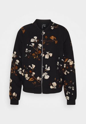 Giacca bomber nera con motivi floreali in beige e marrone. Chiusura con zip, colletto e polsini a coste, e vestibilità rilassata. Tessuto morbido.