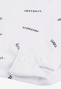 Nike Sportswear TOSS SET - Tracksuit bottoms - black