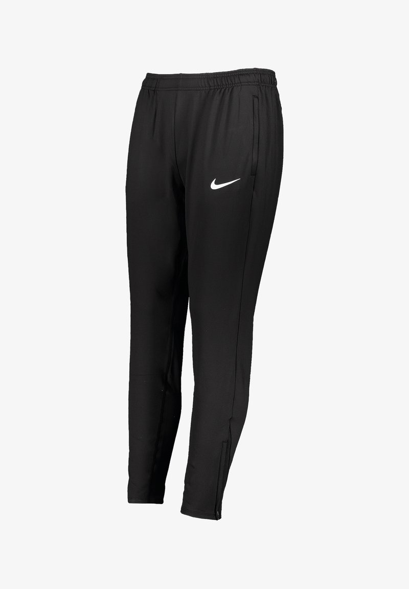 Zwarte sportieve broek van gladde stof met een elastische tailleband, zijzakken en een klein wit Nike-logo op het linkerpand.