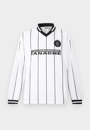 Jersey blanc à manches longues avec des rayures verticales noires, col en V et poignets noirs. Présente un logo circulaire et un texte en gras sur le devant.