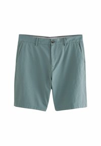Pantaloni scurți din bumbac verde deschis, cu partea din față plată, urechi pentru curea, două buzunare laterale și închidere cu un singur buton. Textură netedă, design casual.