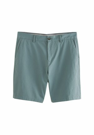 Bermuda in cotone verde chiaro con frontale piatto, passanti per cintura, due tasche laterali e chiusura a singolo bottone. Texture liscia, design casual.