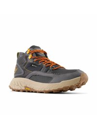 Gray hiking shoe with a textured upper, orange laces, and brown rubber sole. Features a durable design and waterproof technology.