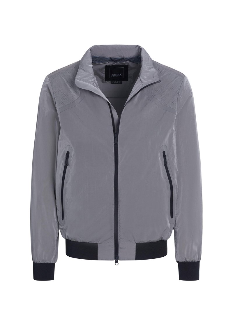 Gray lightweight jacket with a zip front, two side pockets, ribbed cuffs and hem, featuring textured accents on the shoulders.