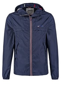 Námořnická lehká bunda s kapucí, vybavená předním zipem, dvěma bočními kapsami, bílými a červenými pruhy a logem na hrudi.