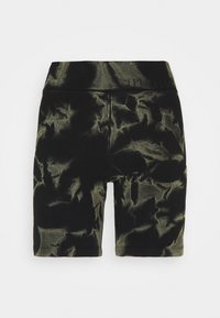 Černé a olivově zelené cyklistické šortky vyrobené z texturované látky s žebrovaným povrchem, s vysokým pasem a přiléhavým střihem.