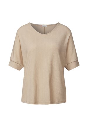 Top de manga corta beige con cuello en V, tejido texturizado y mangas enrolladas. Diseño sencillo, corte holgado, adecuado para uso casual.