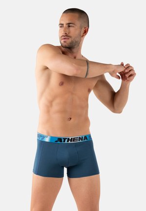 Boxer pour hommes bleu marine avec ceinture élastique noire et bleue de marque. Design lisse et ajusté avec coutures plates.