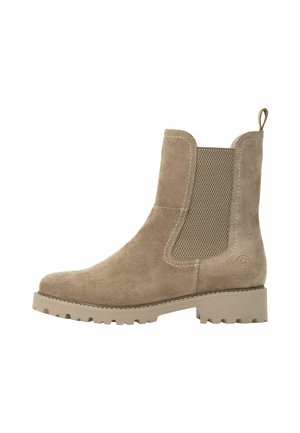 Beige suede ankle boot with chunky sole, elastic side panel, pull tab at back, and low block heel.