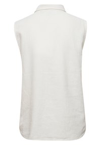 Ärmlös skjorta med krage i ljusbeige linne, med avslappnad passform och rundad nederkant. Slät struktur utan synliga mönster eller dekorationer.