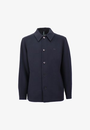 Navy button-up jacket with a collar, long sleeves, eight buttons down the front, and a subtle logo on the left chest. Soft fabric texture.