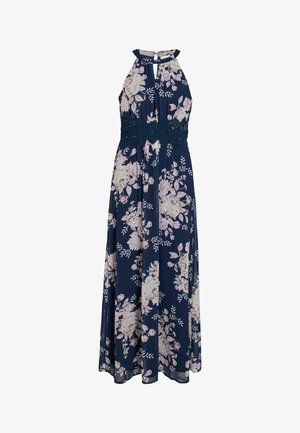 Robe maxi sans manches bleu marine avec motif floral rose et blanc, encolure halter et ceinture en dentelle.