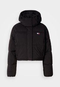 Casaco puffer preto cropped com gola alta, apresentando um patch com a marca, punhos elásticos e bolsos laterais com fecho éclair.