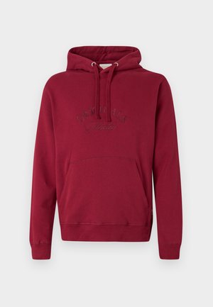 Hanorac cu glugă de culoare burgundă, fabricat dintr-un amestec de bumbac, având o deschidere pentru mâini în stil kangaroo, manșete ribbite și un logo „Originals” embosat pe partea din față.