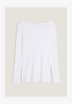 White long-sleeve top with a wide neckline, side slits, and a smooth, lightweight fabric, featuring a simple, minimalistic design.