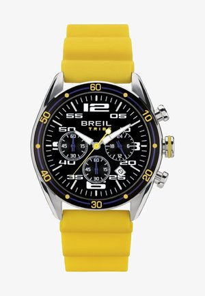 Orologio Breil Tribù con cassa rotonda in acciaio inossidabile argento, quadrante nero, cinturino in silicone giallo e sub-quadranti cronografici multifunzione.
