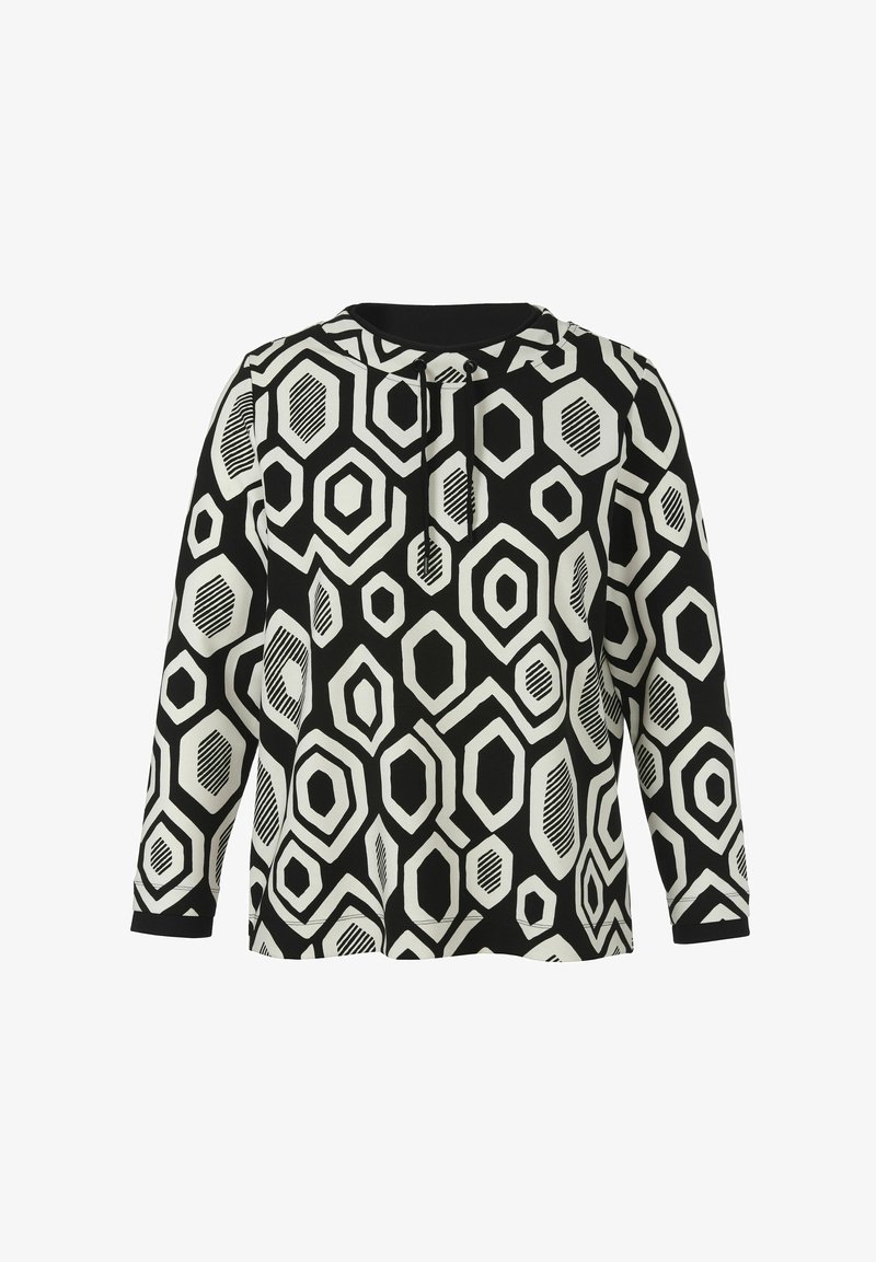 Black and white pullover featuring a geometric hexagonal pattern with varying textures and a hood, crafted from soft fabric.