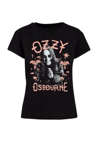 Sort bomulds t-shirt med grafik af en person iført solbriller, omgivet af pink tekst "OZZY" og "OSBOURNE," flagermus og palmer.