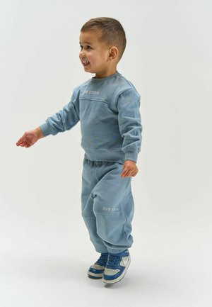 The New Siblings, Pantalon de survêtement - ashley blue