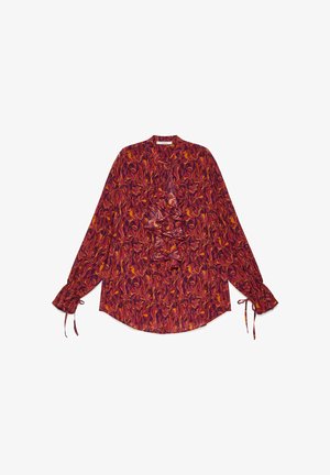 Long-sleeve blouse in deep red with floral pattern. Features ruffled front detailing and tied cuffs. Made from lightweight fabric.