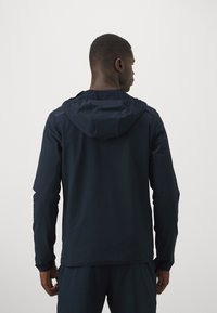 Peak Performance RADIANCE HYBRID HOOD - Outdoorjakke - black