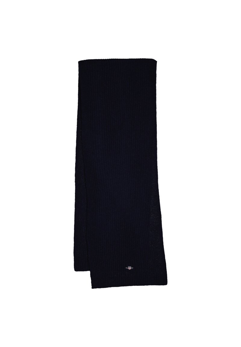 Sciarpa a maglia di un blu navy scuro, forma rettangolare con texture a coste. Presenta un piccolo logo decorativo su un'estremità. Tessuto morbido e misto.
