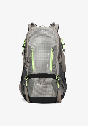 Grey and black hiking backpack with green zipper accents, multiple compartments, padded straps, and "EXPLORATION STYLE" and "Adventure SOL" text.