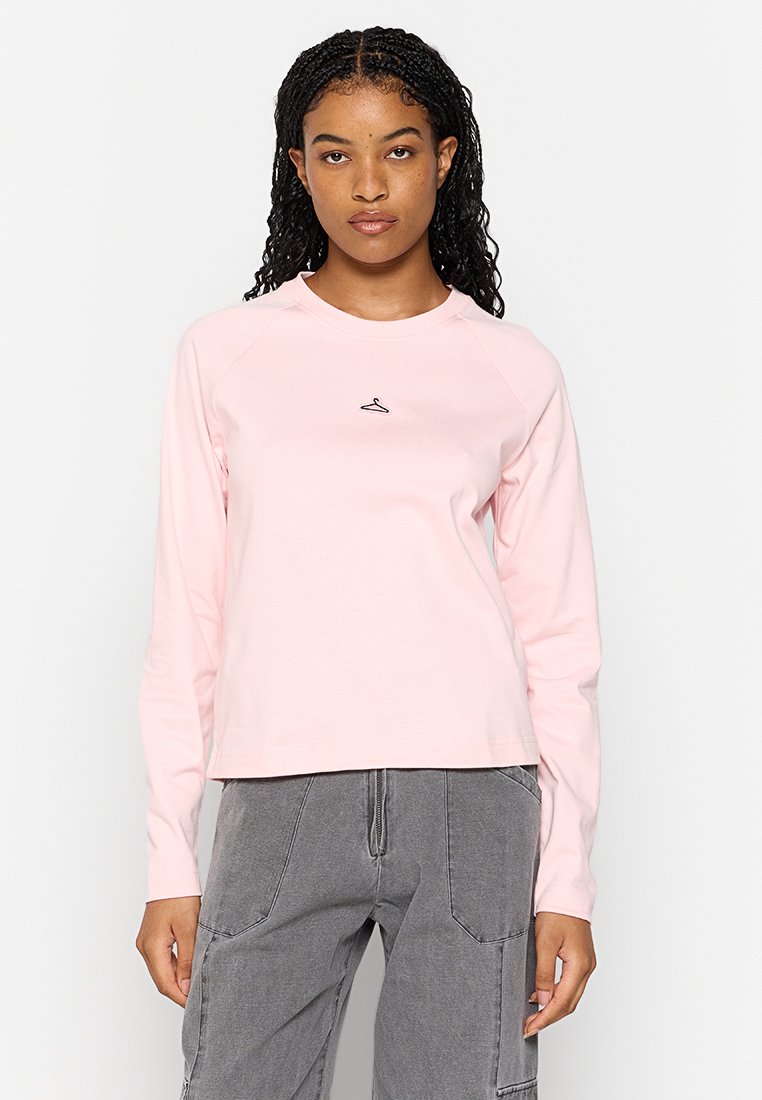 Holzweiler Sweater roze