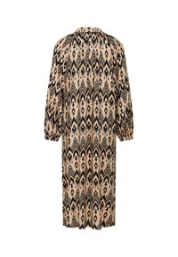 Langes, gemustertes Kleid in Beige mit schwarzen tribalartigen Designs, mit Kragen, langen Puffärmeln und einer lockeren Passform, die bis zur Mitte der Wade reicht.