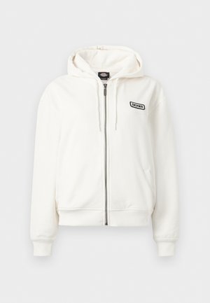 Sweat à capuche zippé blanc avec cordon de serrage à la capuche, poches avant, poignets et ourlet côtelés, et une petite étiquette logo "Dickies" noire sur la poitrine.