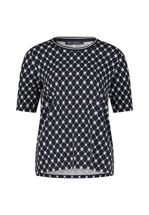 Krótki top z rękawem wykonany z granatowej tkaniny z geometrycznym białym wzorem. Okrągły dekolt i luźny fason z prostym dołem.
