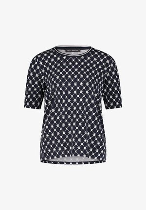 Haut à manches courtes en tissu bleu marine avec un motif géométrique blanc. Encolure ronde et coupe décontractée avec un ourlet droit.