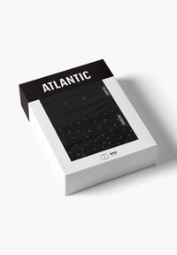 Czarne pudełko zawierające dwie pary męskich bokserek. Jedna para ma biały wzór w kropki, a druga wyróżnia się zielonymi akcentami liści.