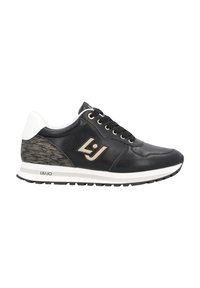 Sneaker in pelle nera con tallone bianco, dettagli dorati, pannello laterale testurizzato, punta rotonda e suola bianca a contrasto. Logo del marchio visibile.